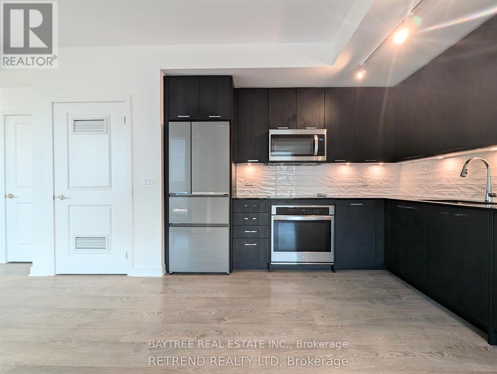506 - 120 Eagle Rock Way, Vaughan, ON - Indoor Photo Showing Kitchen