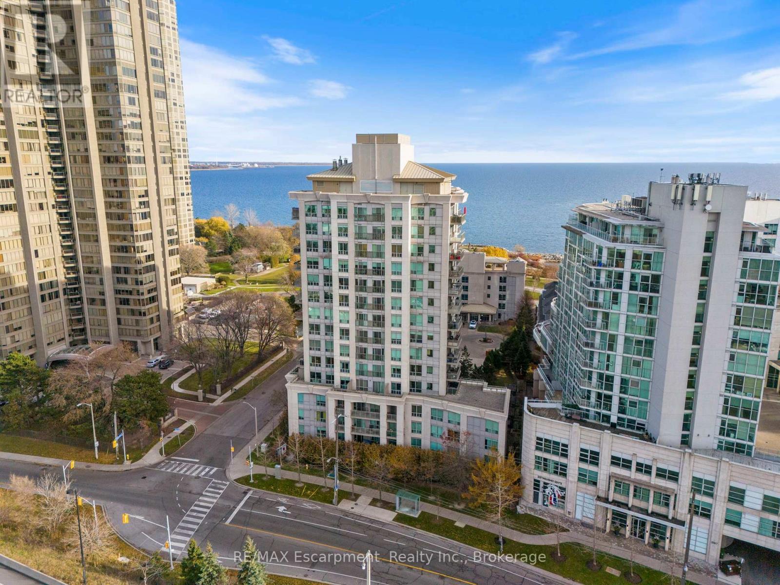 902 - 88 Palace Pier, Toronto (Mimico), ON - Outdoor With Body Of Water With Facade