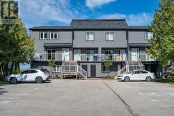 Front of Building and assigned parking -