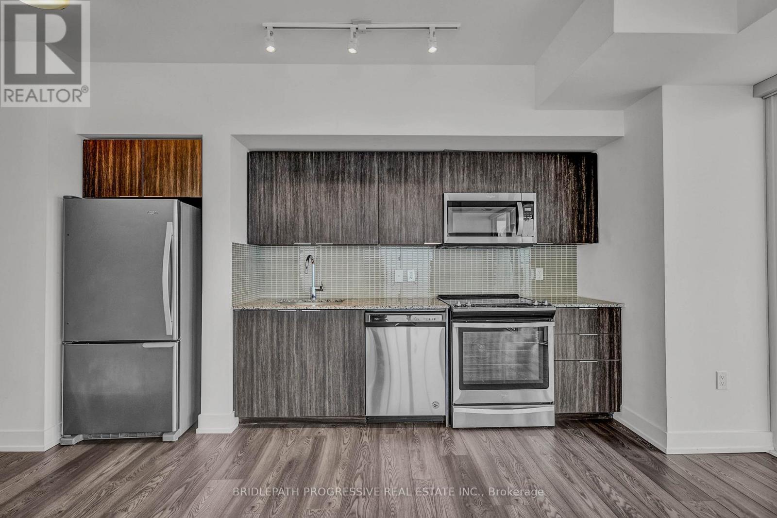 Ph-07 - 30 Shore Breeze Drive, Toronto, ON - Indoor Photo Showing Kitchen With Stainless Steel Kitchen
