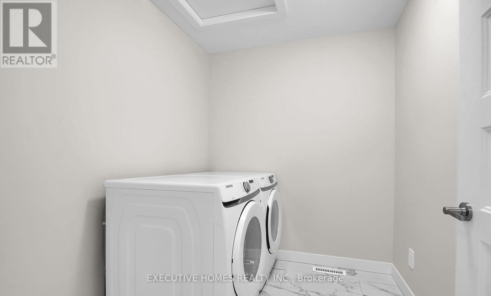 6937 Royal Magnolia Avenue, London South, ON - Indoor Photo Showing Laundry Room
