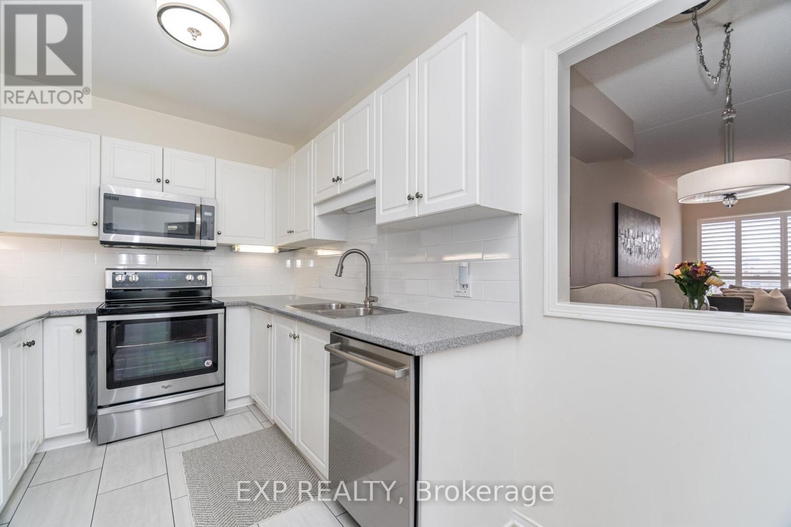 619 - 2075 Amherst Heights Drive, Burlington, ON - Indoor Photo Showing Kitchen With Stainless Steel Kitchen With Double Sink