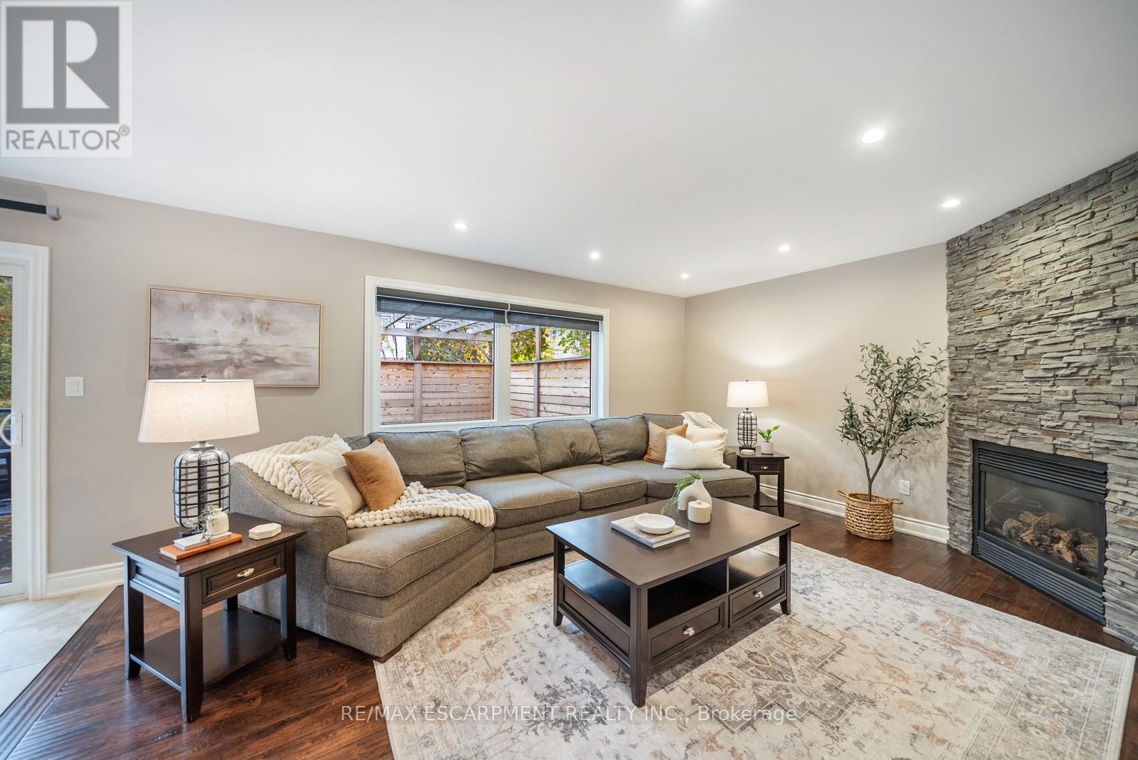 1351 Mcguffin Gate, Milton, ON - Indoor Photo Showing Living Room With Fireplace