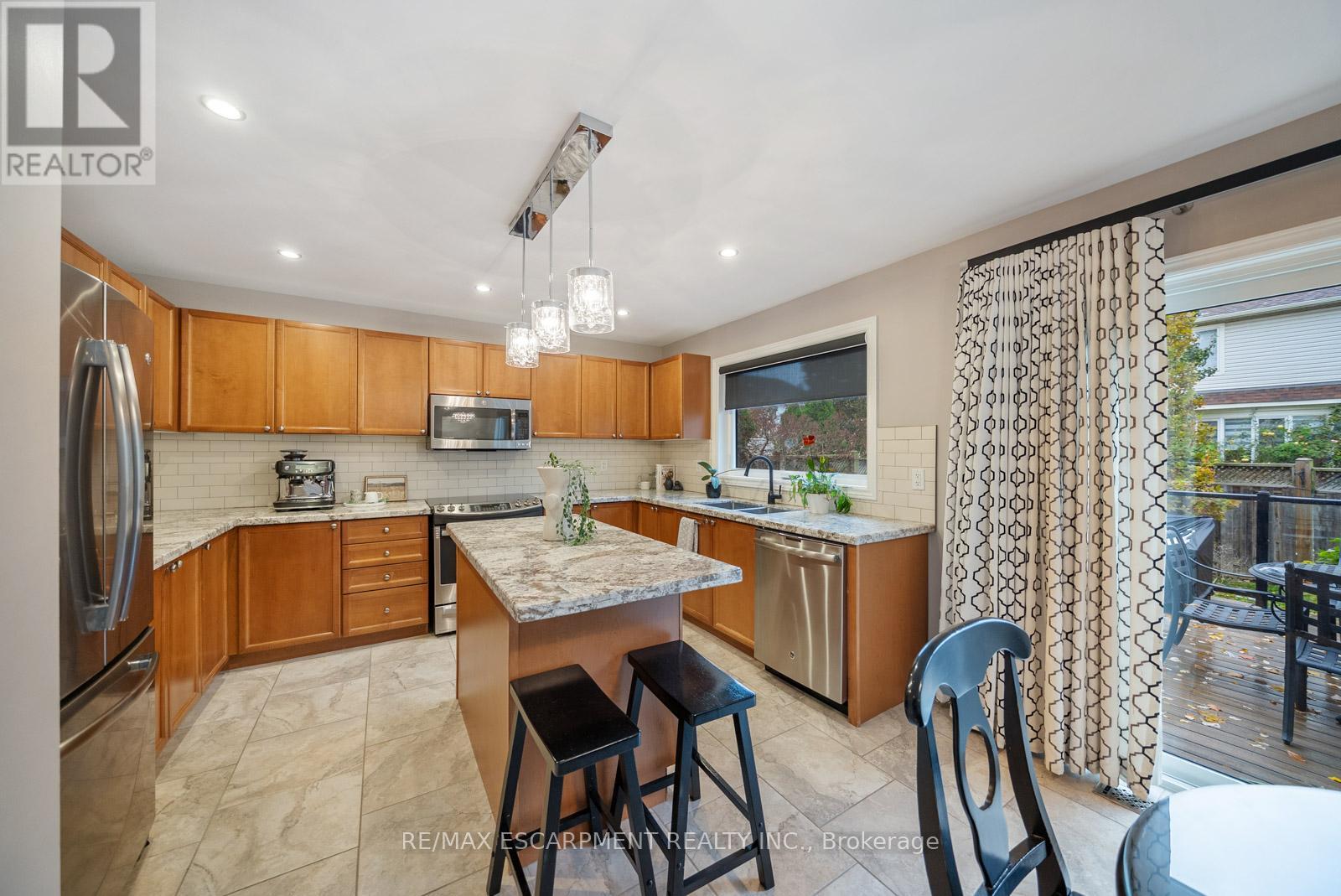 1351 Mcguffin Gate, Milton, ON - Indoor Photo Showing Kitchen With Double Sink
