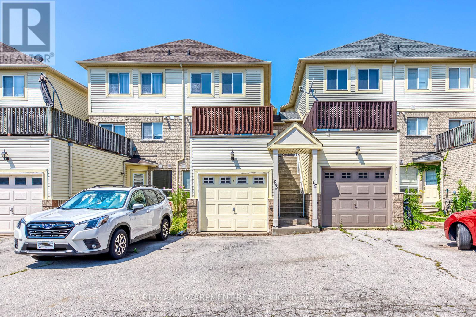 63 - 1489 Heritage Way, Oakville, ON - Outdoor With Facade