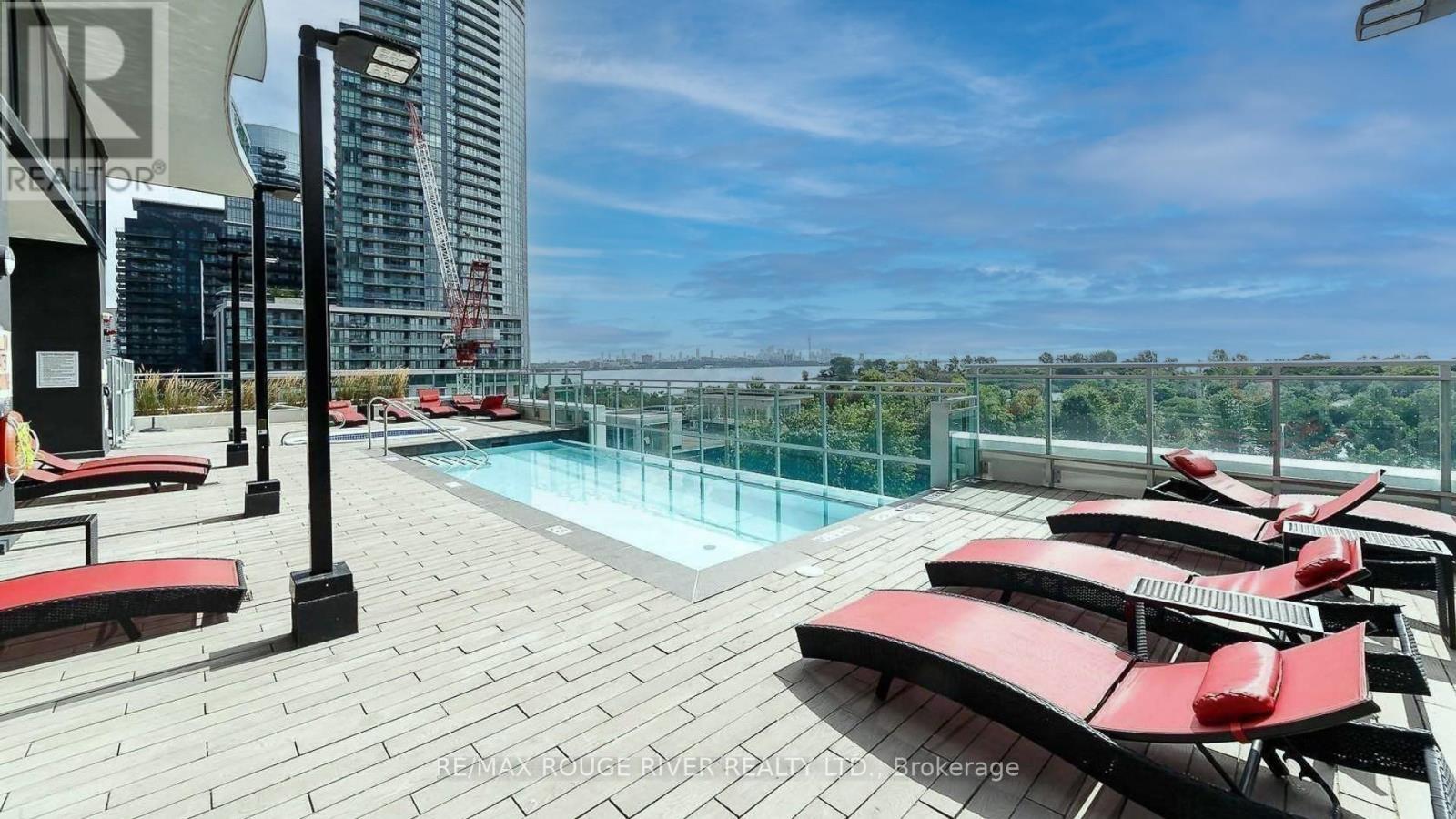 906 - 33 Shore Breeze Drive, Toronto, ON - Outdoor With In Ground Pool