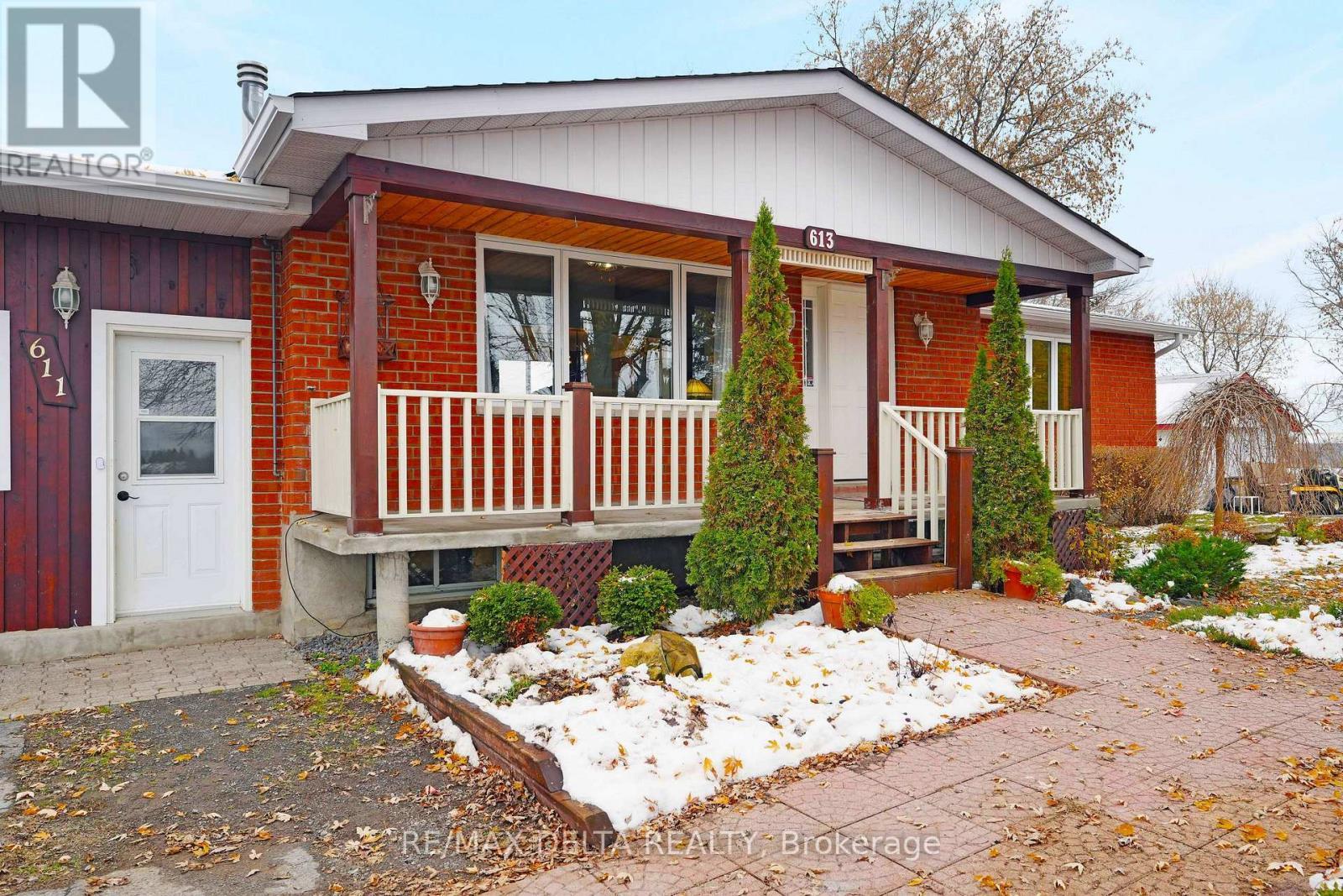 Closeup Front View - Covered Porch - 611 & 613 St Isidore Street, The Nation, ON - Outdoor With Deck Patio Veranda