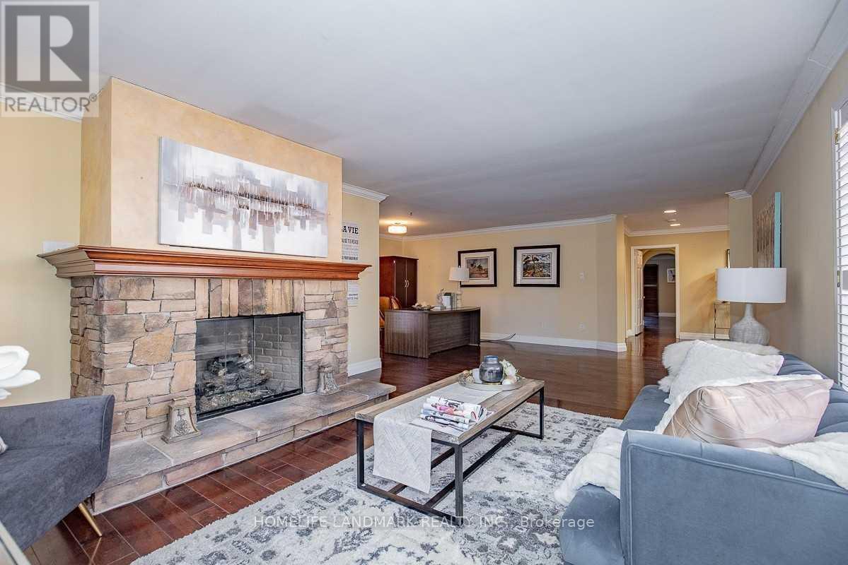 2301 Bennington Gate, Oakville, ON - Indoor Photo Showing Living Room With Fireplace