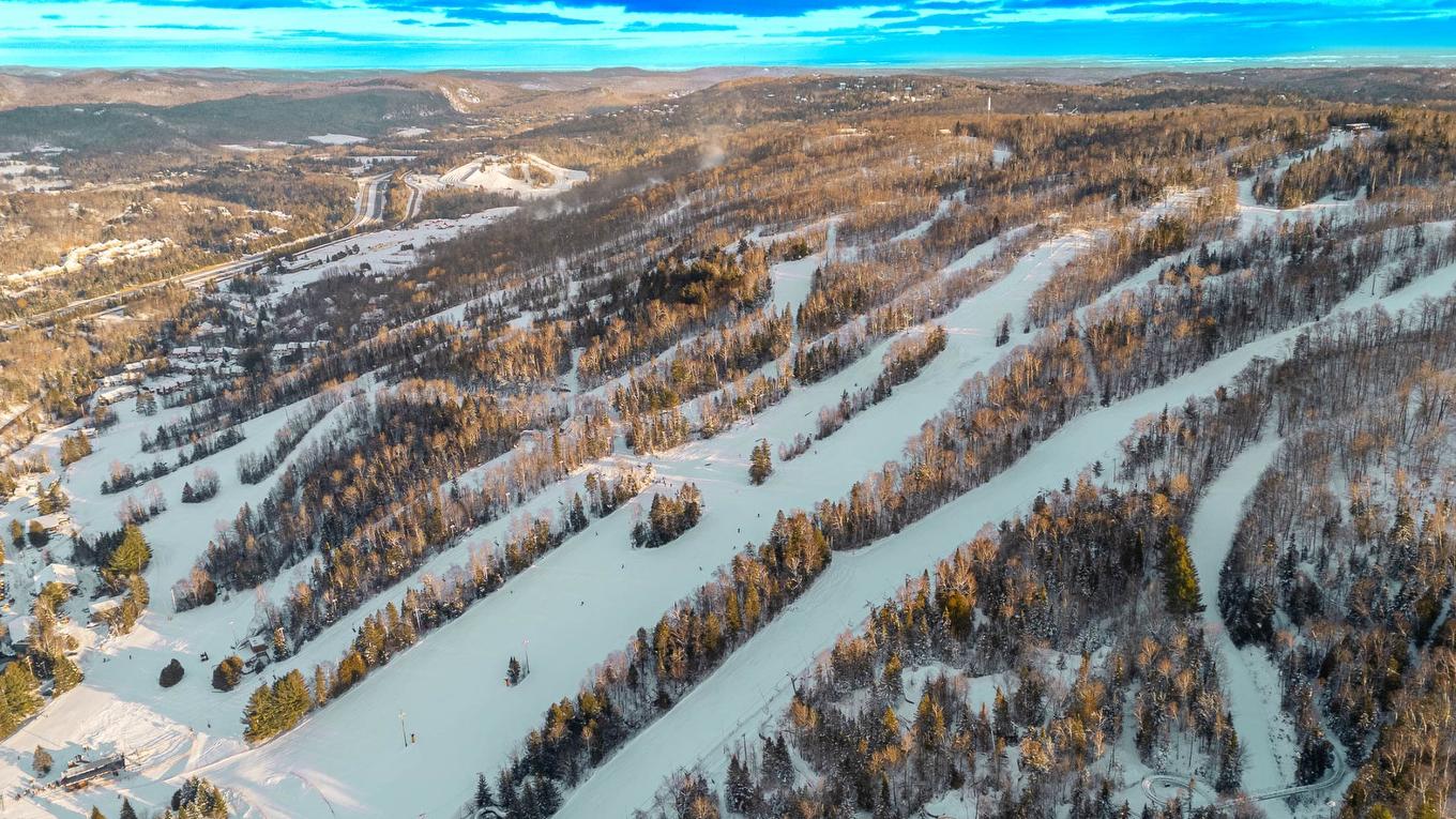 Aerial photo - 203 Mtée Victor-Nymark, Saint-Sauveur, QC - Outdoor With View