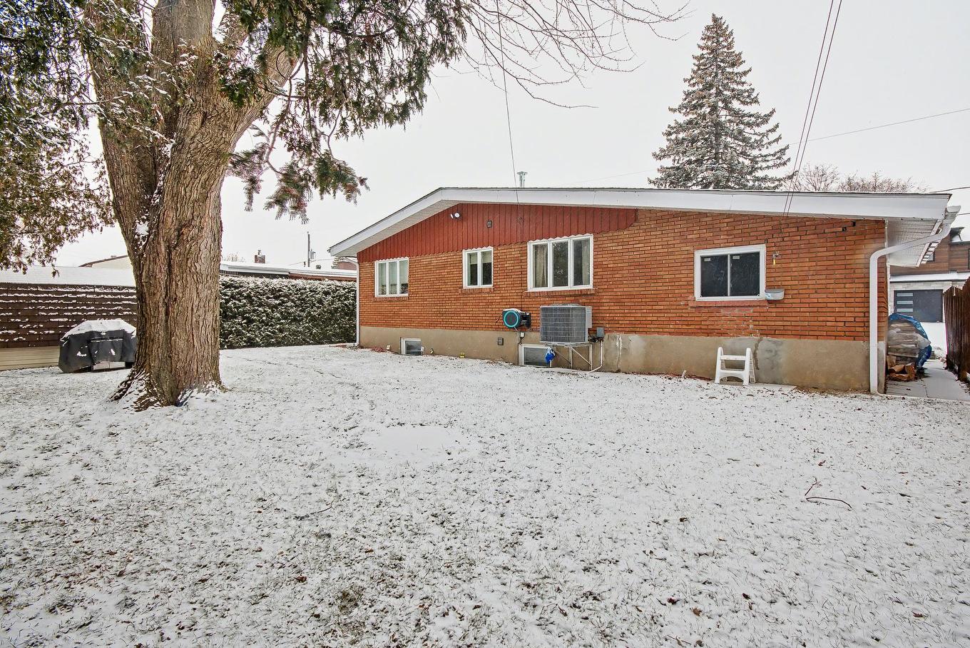 Backyard - 3595 Rue Duvernay, Longueuil (Saint-Hubert), QC - Outdoor With Exterior