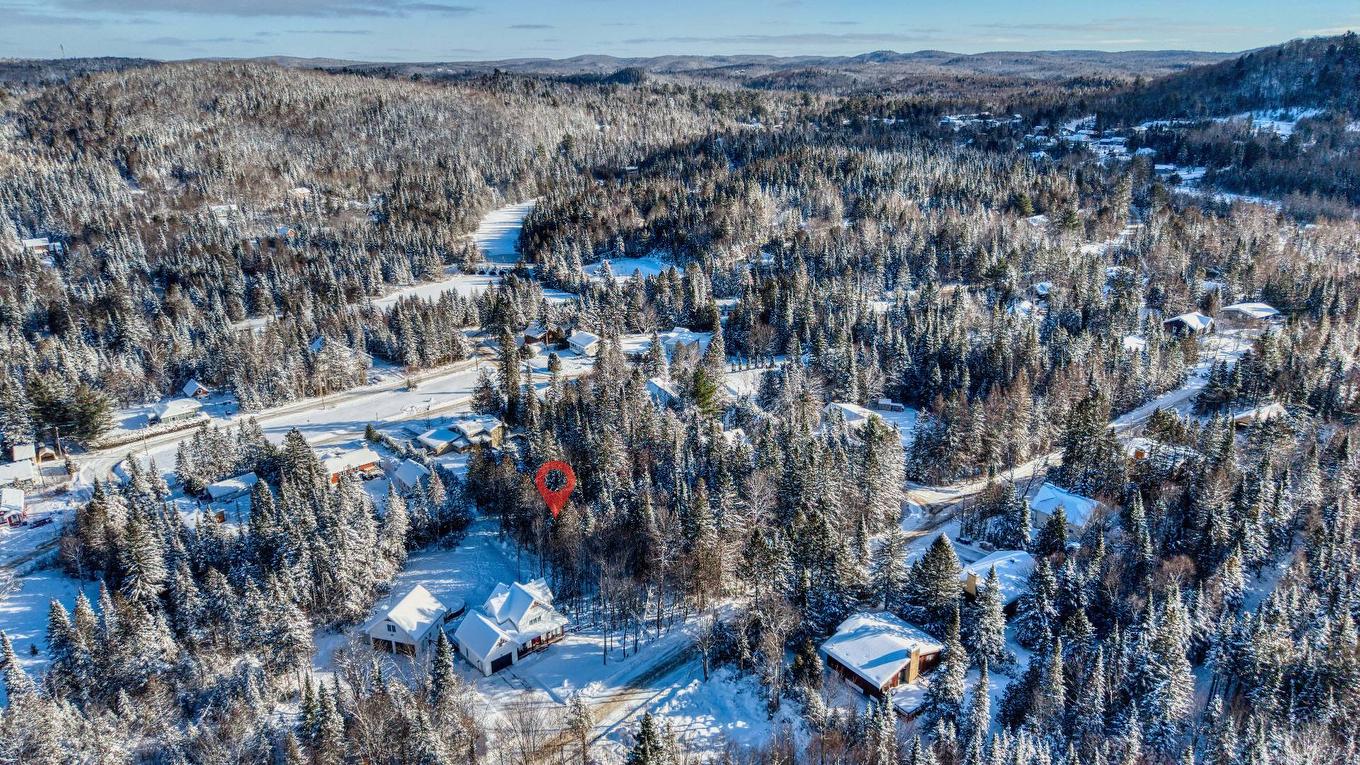 Aerial photo - 52 Rue Du Sommet-Du-Parc, Sainte-Marguerite-Du-Lac-Masson, QC - Outdoor With View