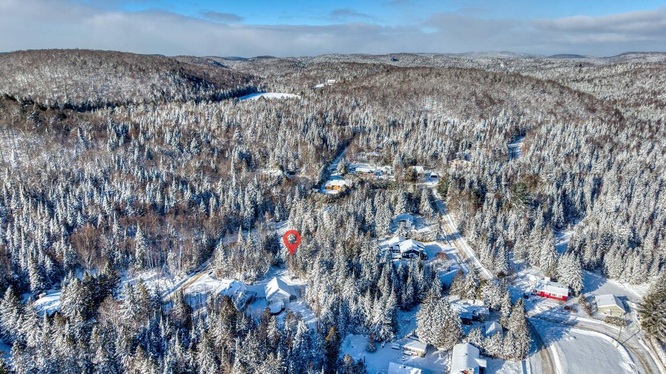Aerial photo - 52 Rue Du Sommet-Du-Parc, Sainte-Marguerite-Du-Lac-Masson, QC - Outdoor With View
