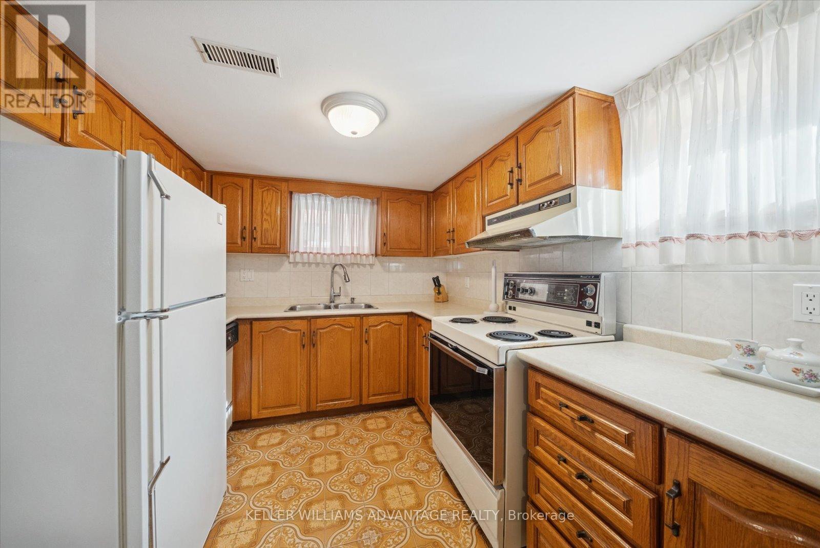 63 Boem Avenue, Toronto, ON - Indoor Photo Showing Kitchen With Double Sink