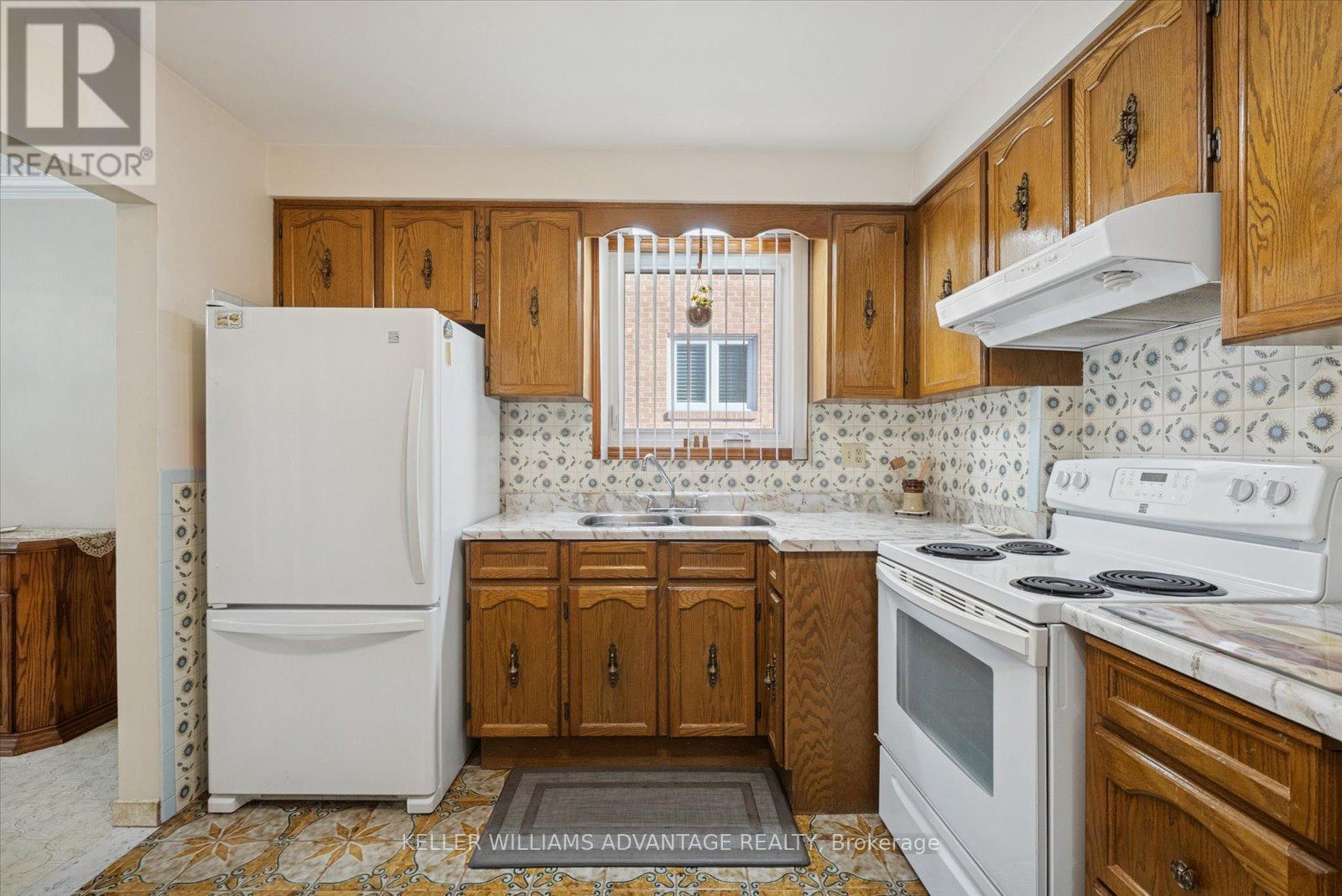 63 Boem Avenue, Toronto, ON - Indoor Photo Showing Kitchen With Double Sink