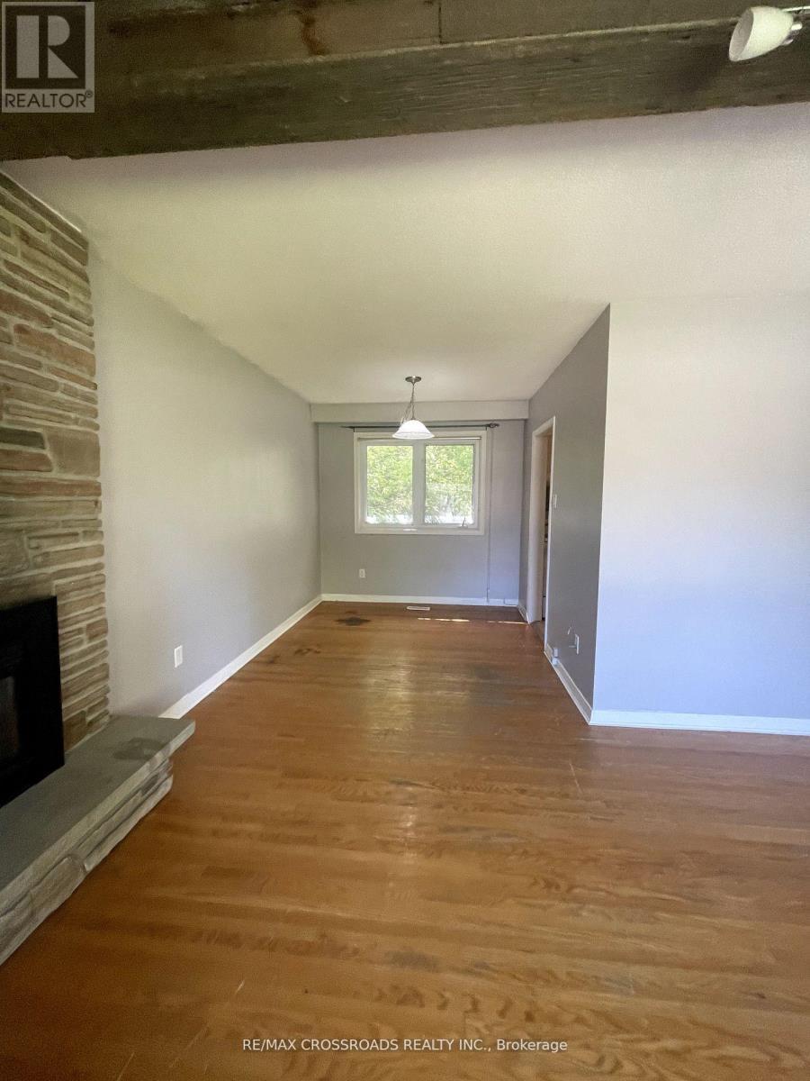 Upper - 89 Ottaway Avenue, Barrie, ON - Indoor Photo Showing Other Room With Fireplace