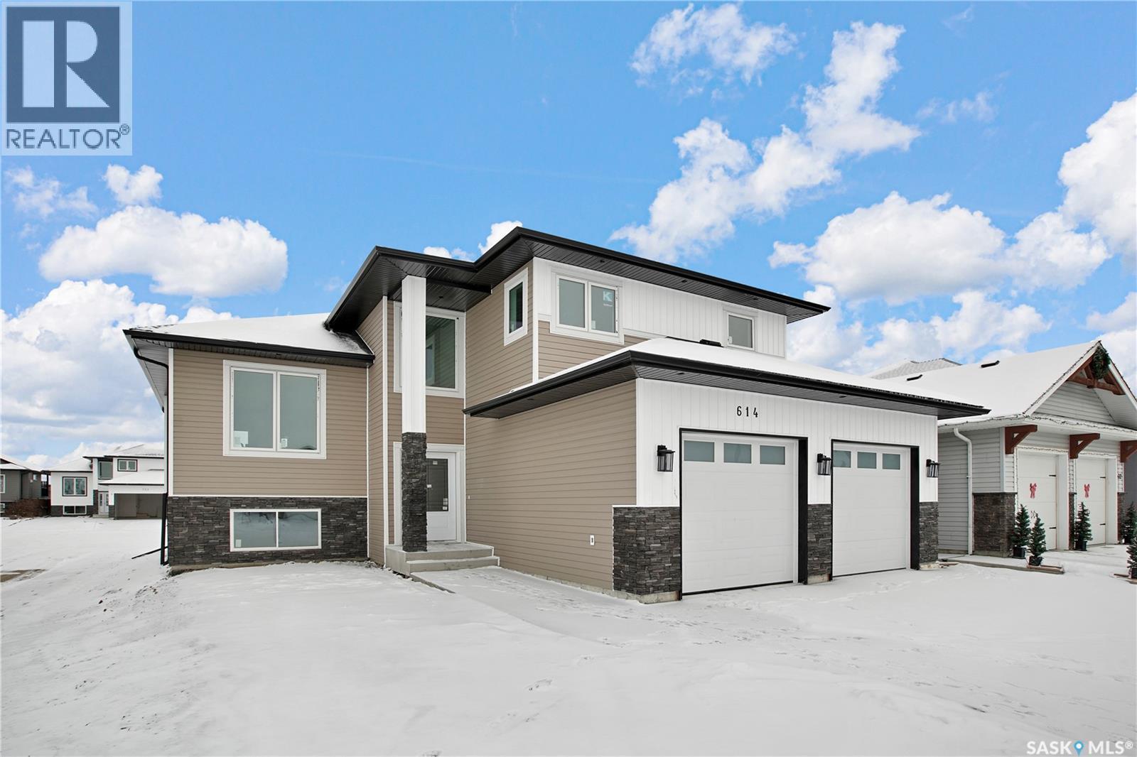 614 Casper Cove, Warman, SK - Outdoor With Facade