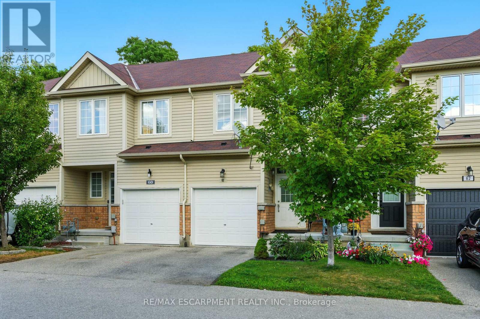 61 - 21 Diana Avenue, Brantford, ON - Outdoor With Facade