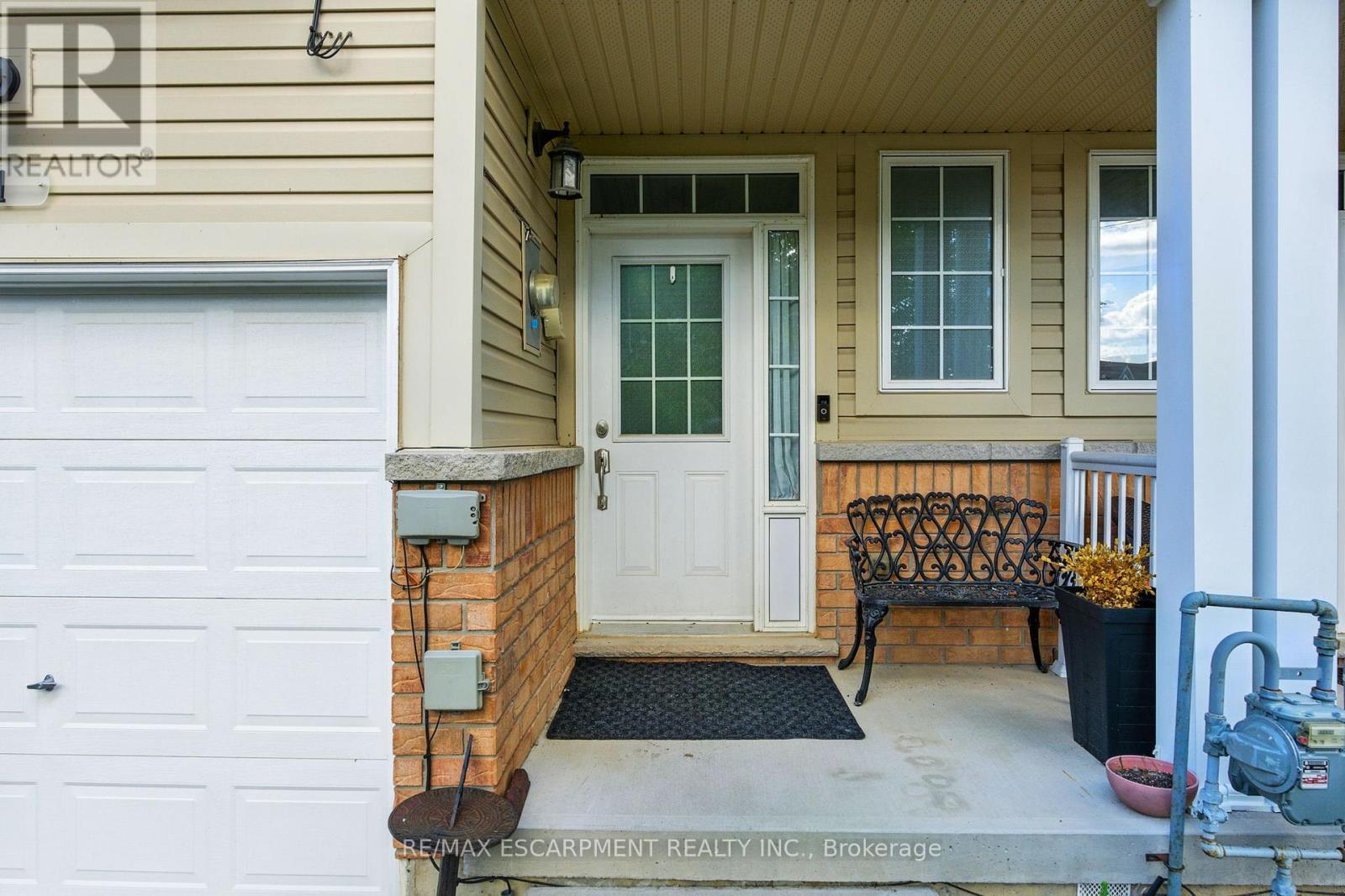 61 - 21 Diana Avenue, Brantford, ON - Outdoor With Deck Patio Veranda With Exterior