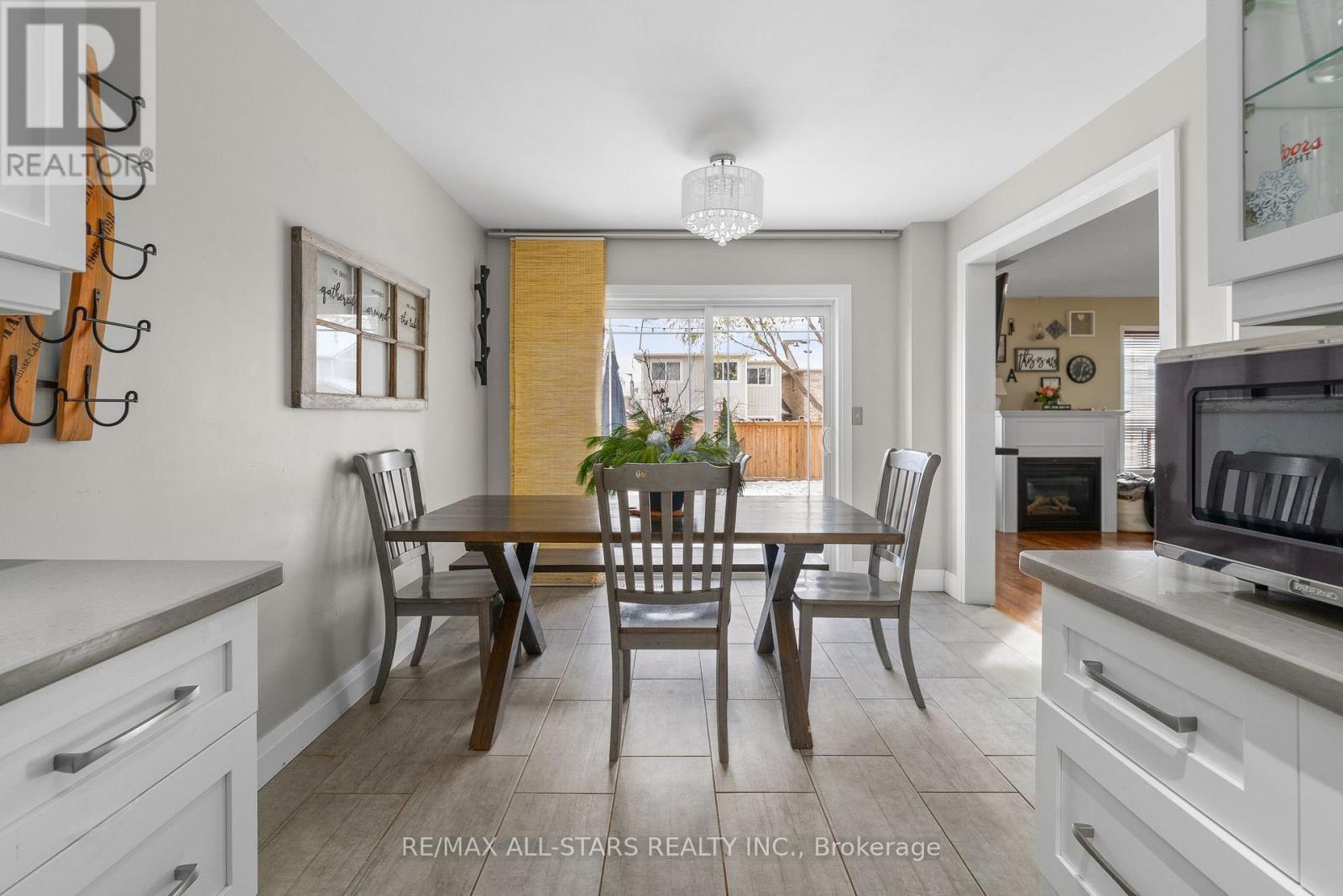 72 Wessex Drive, Whitby (Brooklin), ON - Indoor Photo Showing Dining Room With Fireplace