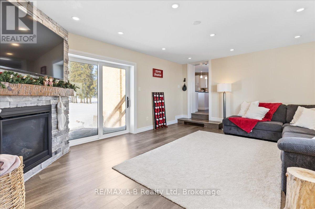 5145 Perth Line 44, Perth South (Sebringville), ON - Indoor Photo Showing Living Room With Fireplace