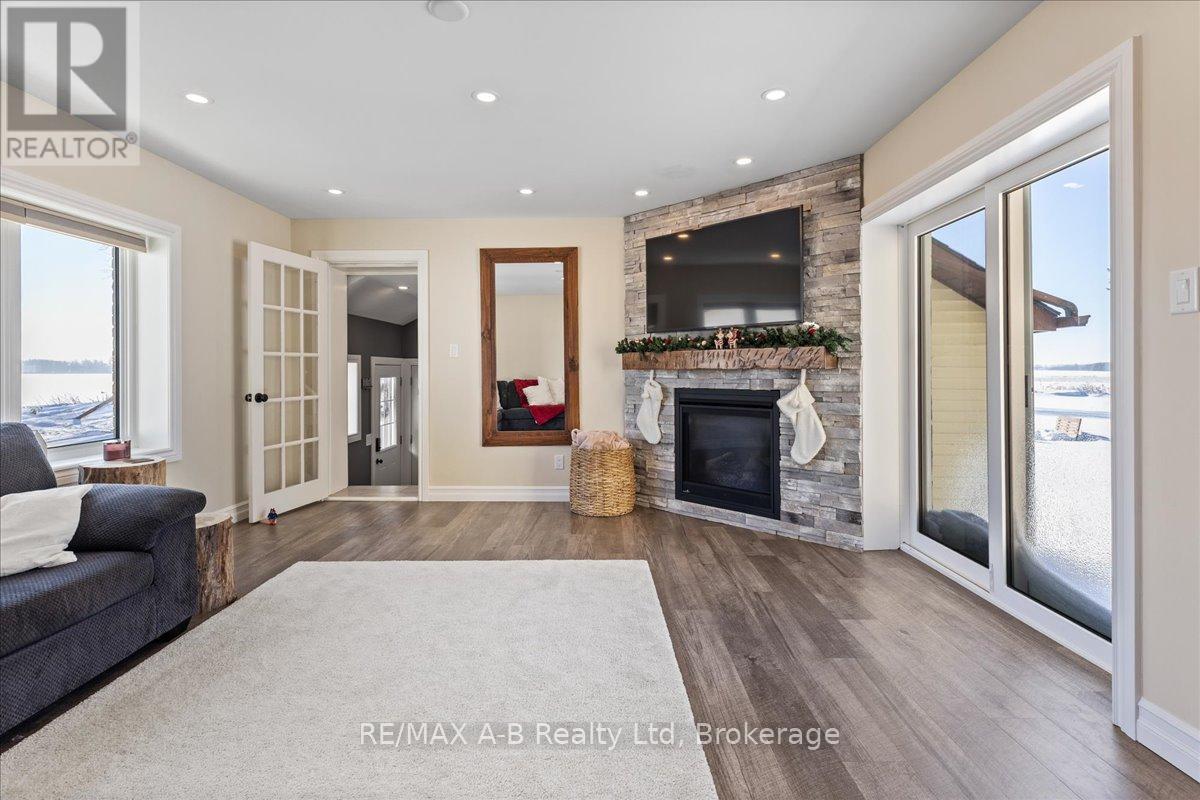 5145 Perth Line 44, Perth South (Sebringville), ON - Indoor Photo Showing Living Room With Fireplace