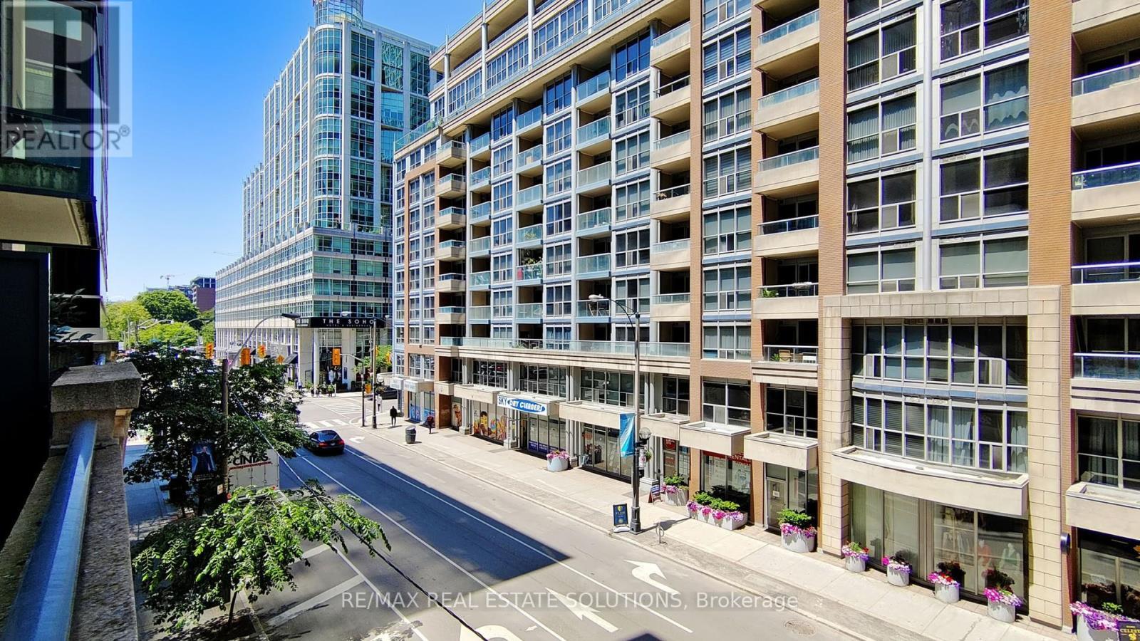 302 - 263 Wellington Street W, Toronto, ON - Outdoor With Facade