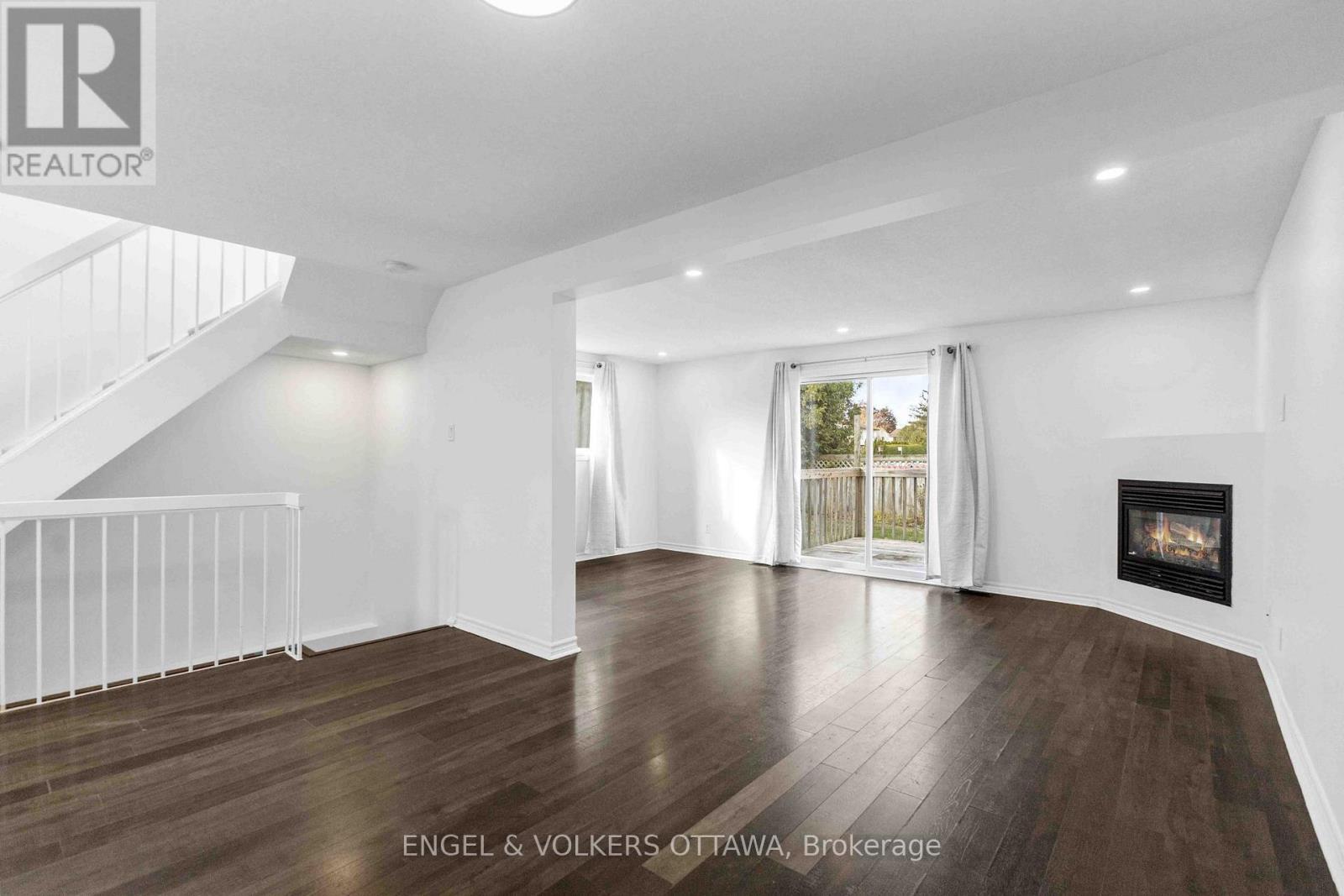 1 Berkshire Way, Ottawa, ON - Indoor Photo Showing Living Room With Fireplace