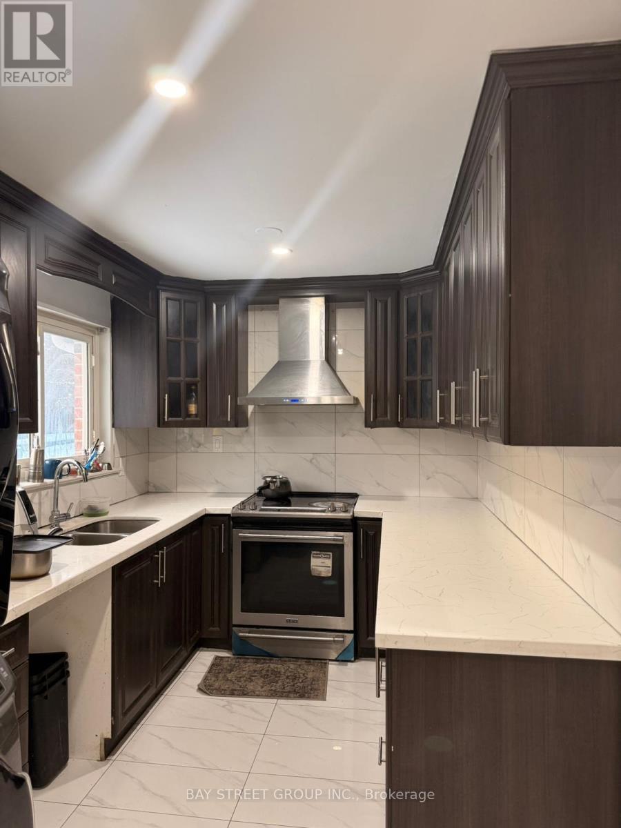 193 Mcmurchy Avenue S, Brampton, ON - Indoor Photo Showing Kitchen With Double Sink