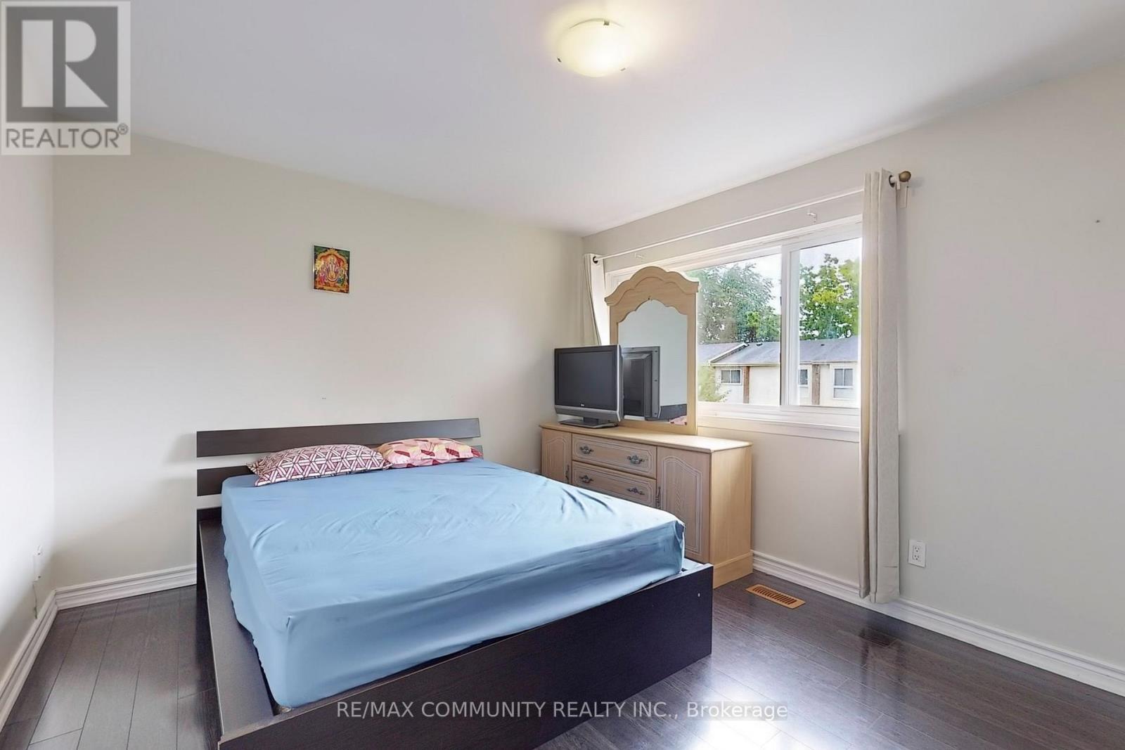 4 - 2451 Bridletowne Circle, Toronto, ON - Indoor Photo Showing Bedroom