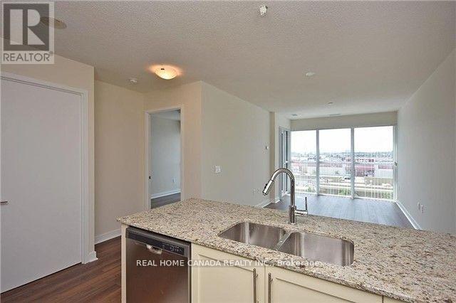 409 - 3975 Grand Park Drive, Mississauga, ON - Indoor Photo Showing Kitchen With Double Sink