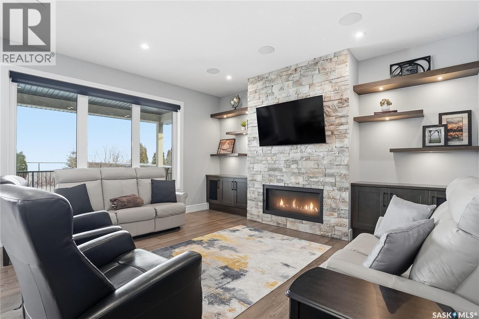 359 Mahabir Court, Saskatoon, SK - Indoor Photo Showing Living Room With Fireplace