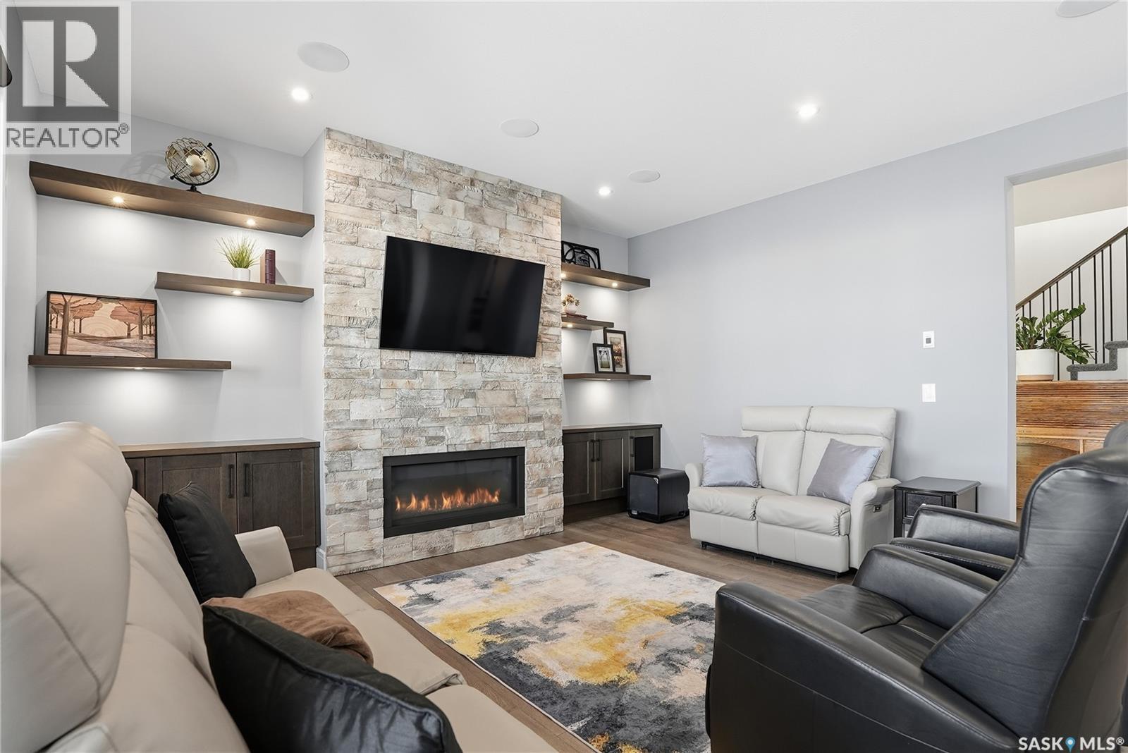 359 Mahabir Court, Saskatoon, SK - Indoor Photo Showing Living Room With Fireplace