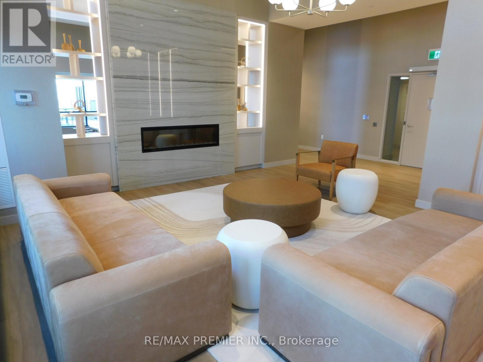 Serenity Lounge 2 - 2001 - 8960 Jane Street, Vaughan, ON - Indoor Photo Showing Living Room With Fireplace