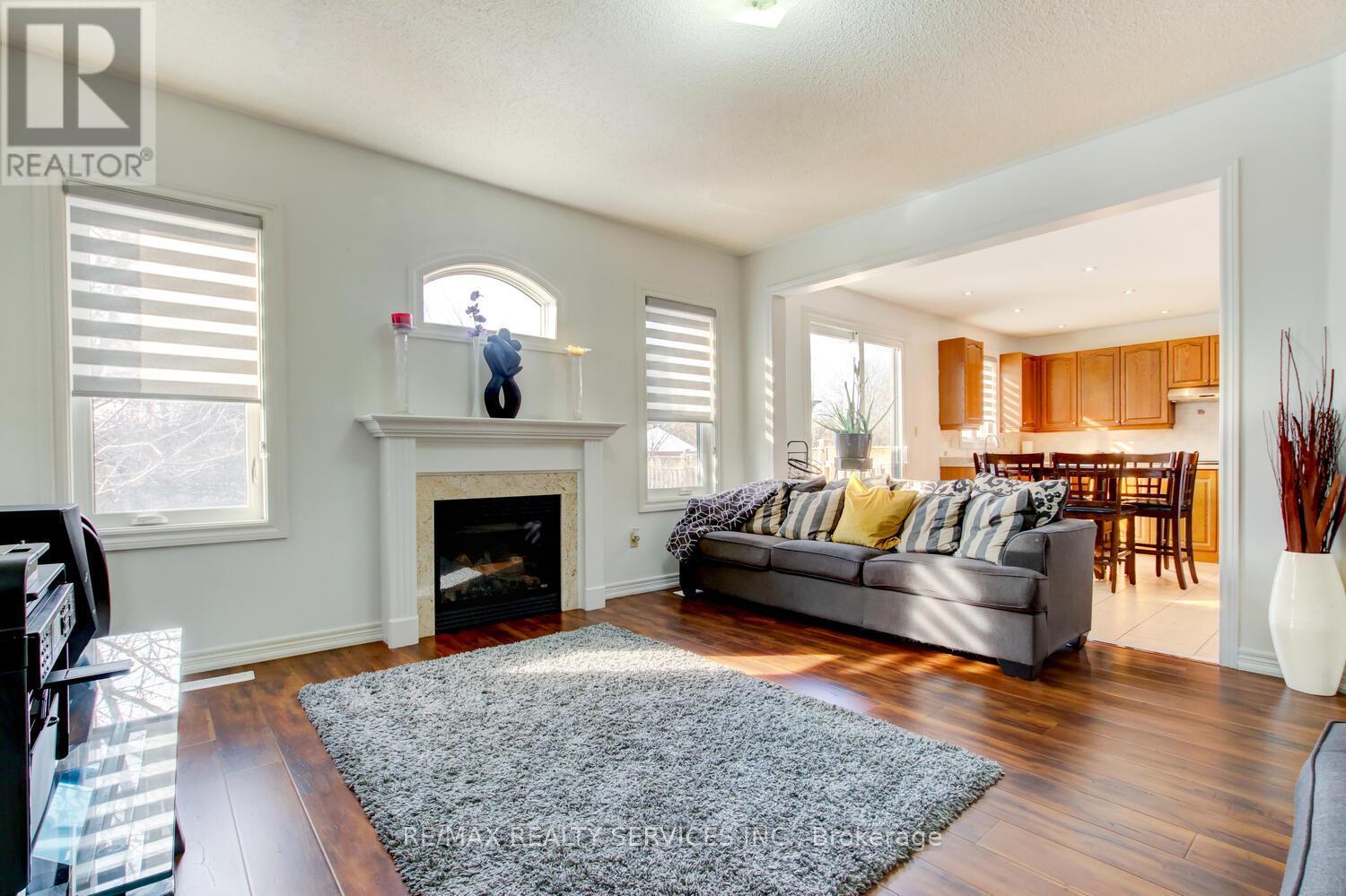 38 Cape Dorset Crescent, Brampton, ON - Indoor Photo Showing Living Room With Fireplace