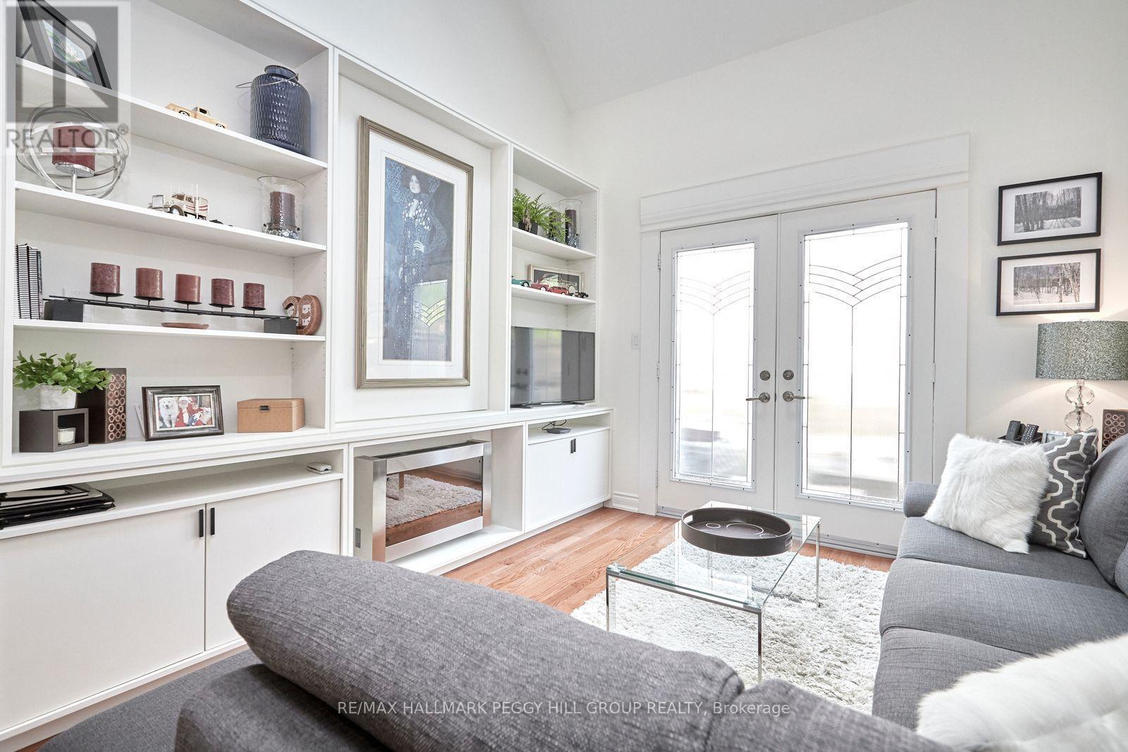 11 - 125 Huronia Road, Barrie, ON - Indoor Photo Showing Living Room With Fireplace