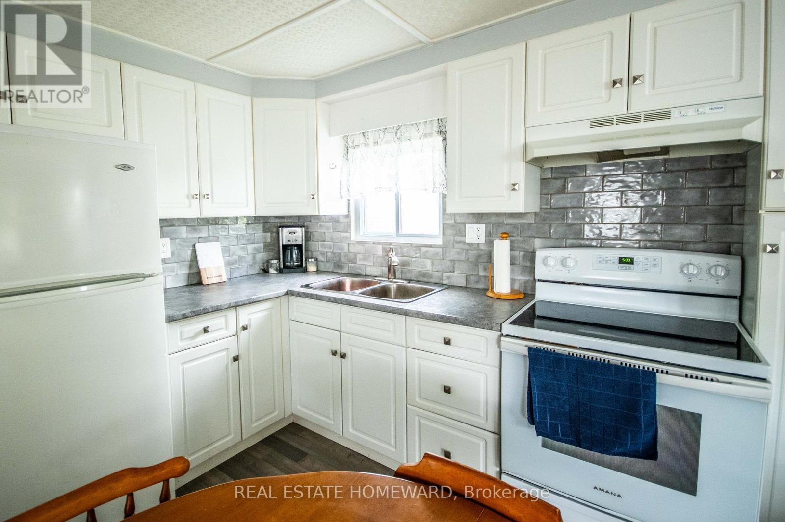 36B - 2244 Heritage Line, Otonabee-South Monaghan, ON - Indoor Photo Showing Kitchen With Double Sink