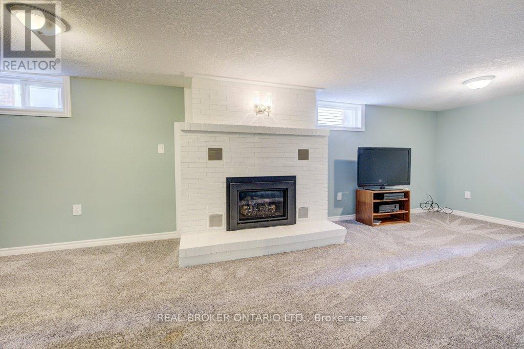 87 Southwood Drive, Cambridge, ON - Indoor Photo Showing Basement With Fireplace