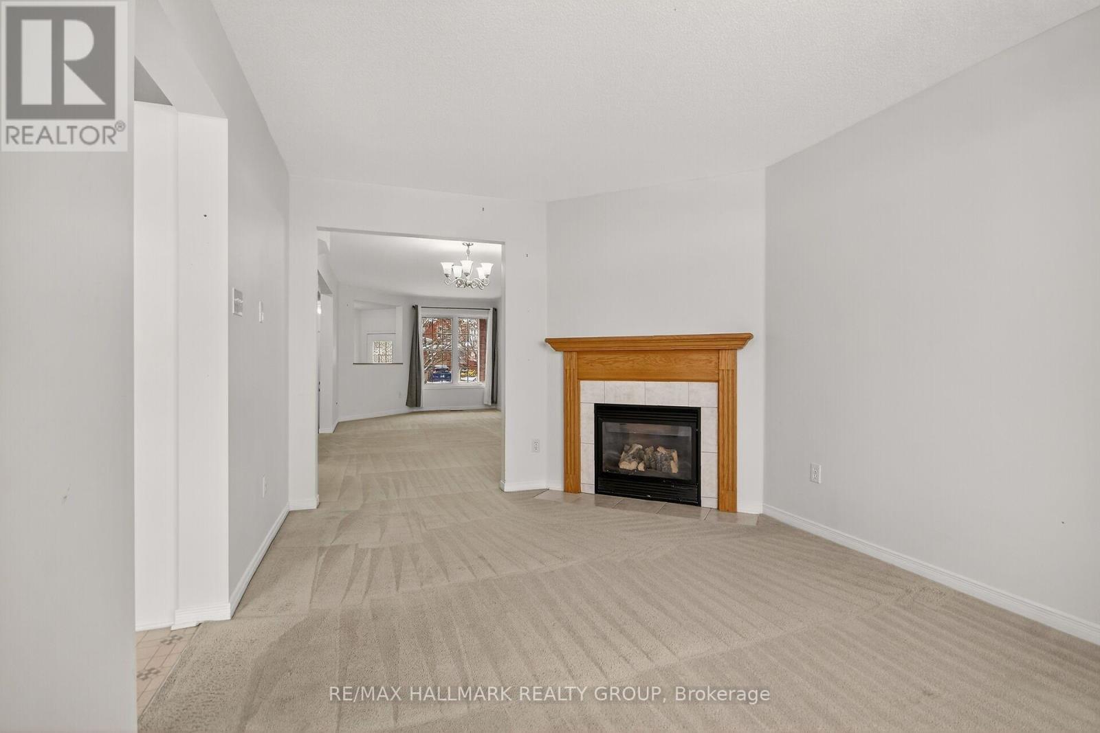 1505 Demeter Street, Ottawa, ON - Indoor Photo Showing Living Room With Fireplace