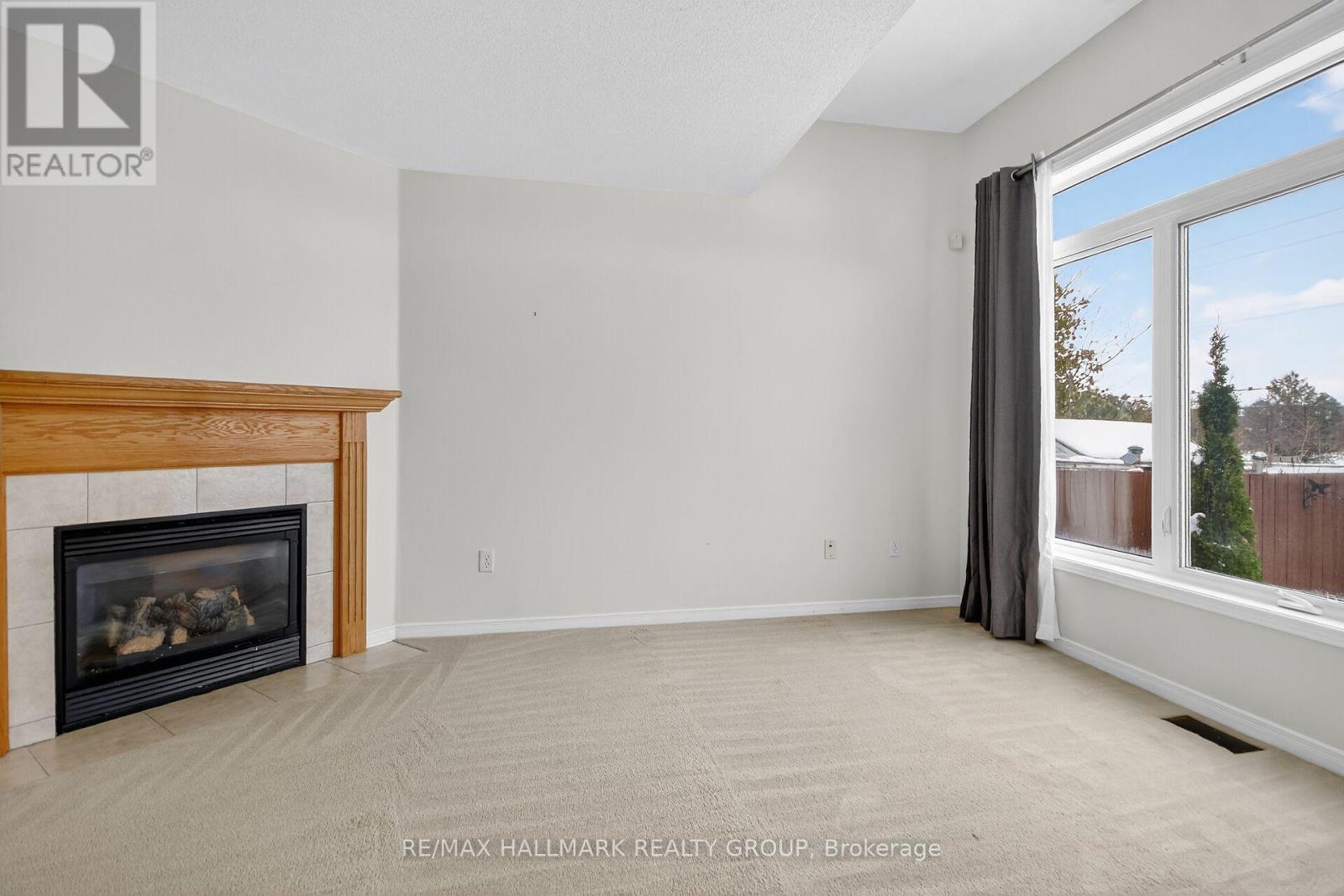 Family Room - 1505 Demeter Street, Ottawa, ON - Indoor Photo Showing Living Room With Fireplace