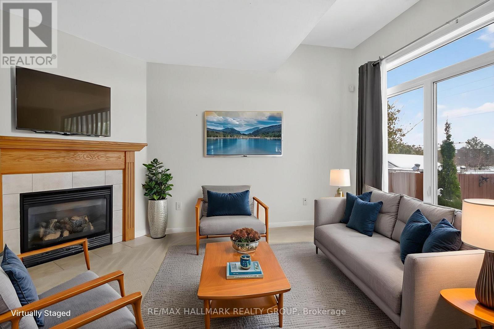 1505 Demeter Street, Ottawa, ON - Indoor Photo Showing Living Room With Fireplace