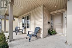 INVITING FRONT PORCH W/ ROOM TO KICK YOUR FEET UP! -