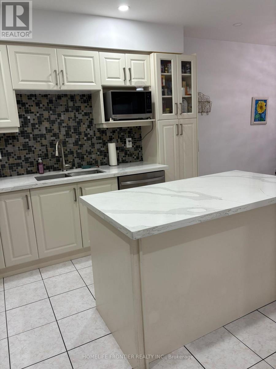 ISLAND - 106 Casabel Drive W, Vaughan, ON - Indoor Photo Showing Kitchen With Double Sink