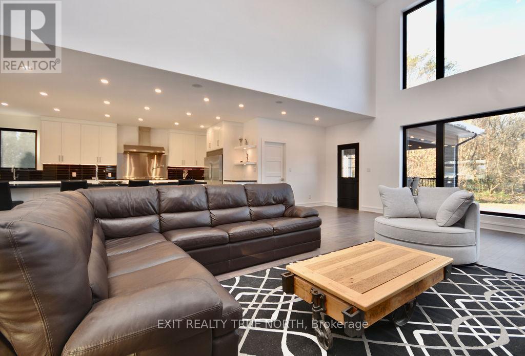 57 Glenhuron Drive, Springwater, ON - Indoor Photo Showing Living Room