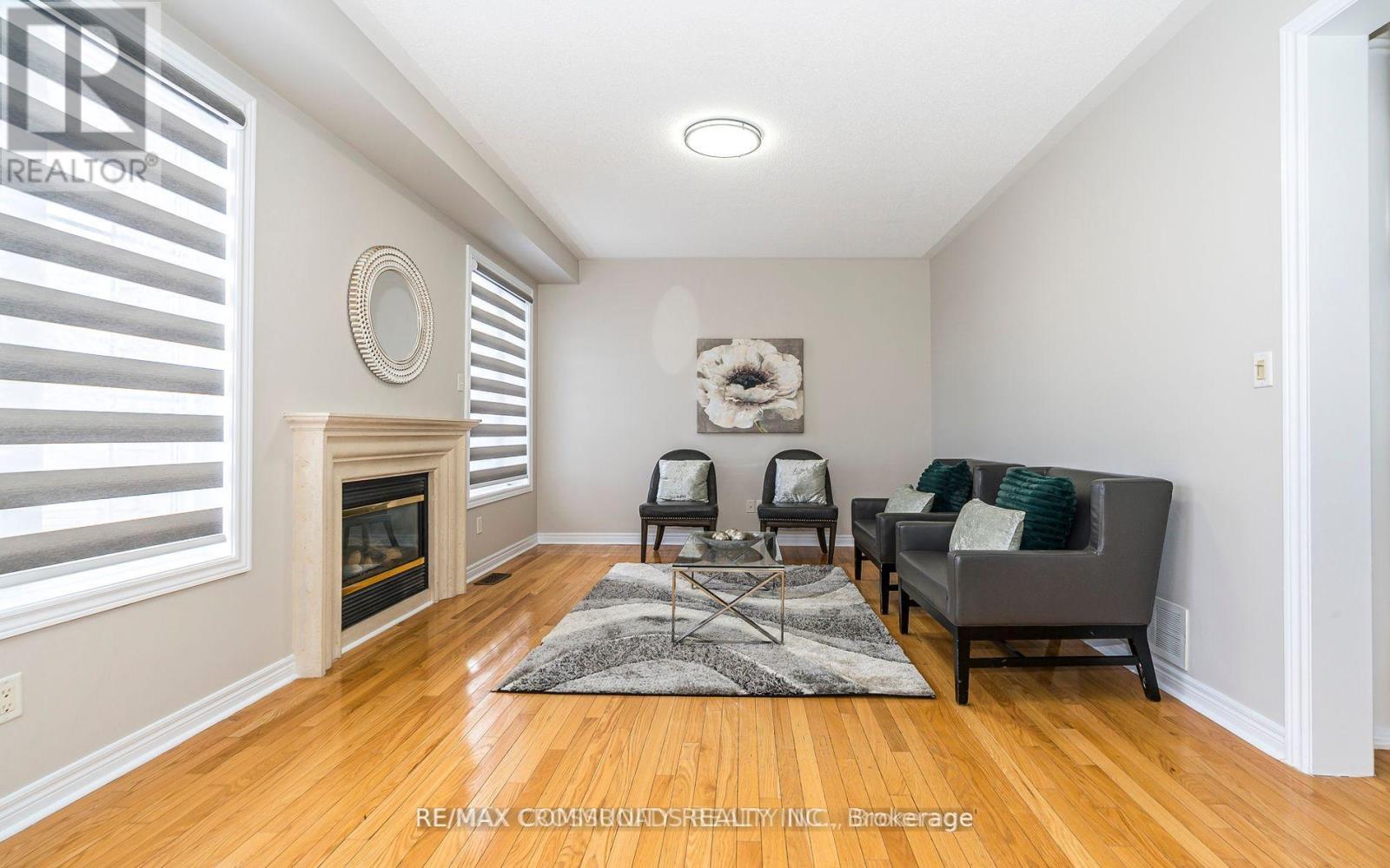 24 Cozens Drive, Richmond Hill, ON - Indoor Photo Showing Living Room With Fireplace