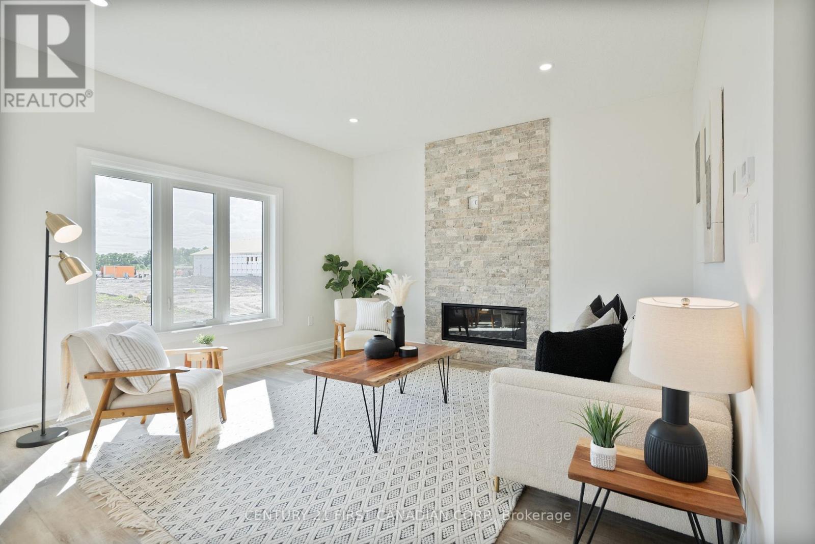 113 Atkinson Street, North Middlesex (Alisa Craig), ON - Indoor Photo Showing Living Room With Fireplace