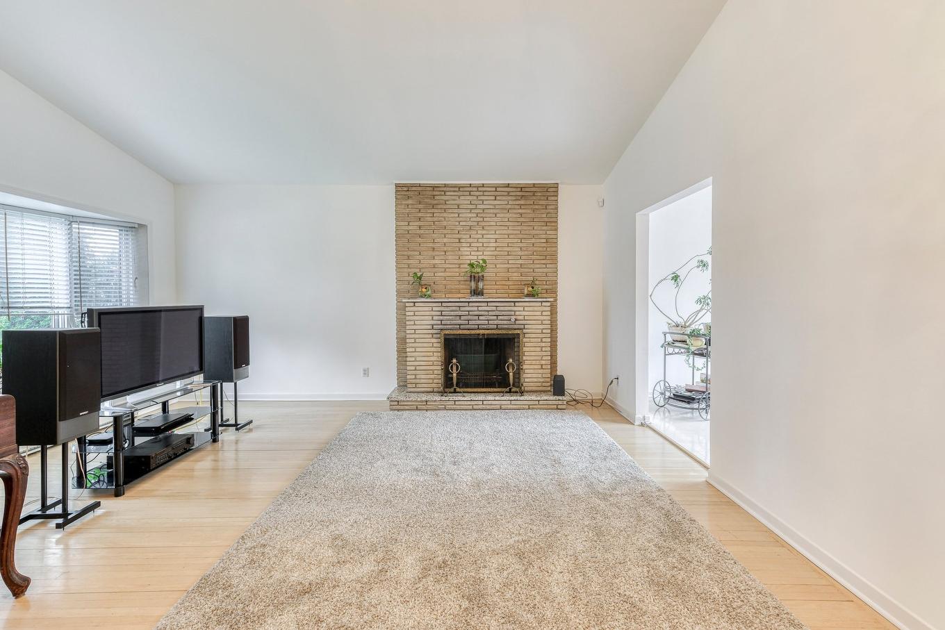 Salon - 4304 7E Rue, Laval (Chomedey), QC - Indoor Photo Showing Other Room With Fireplace