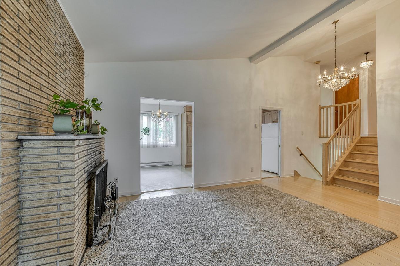 Salon - 4304 7E Rue, Laval (Chomedey), QC - Indoor Photo Showing Other Room With Fireplace