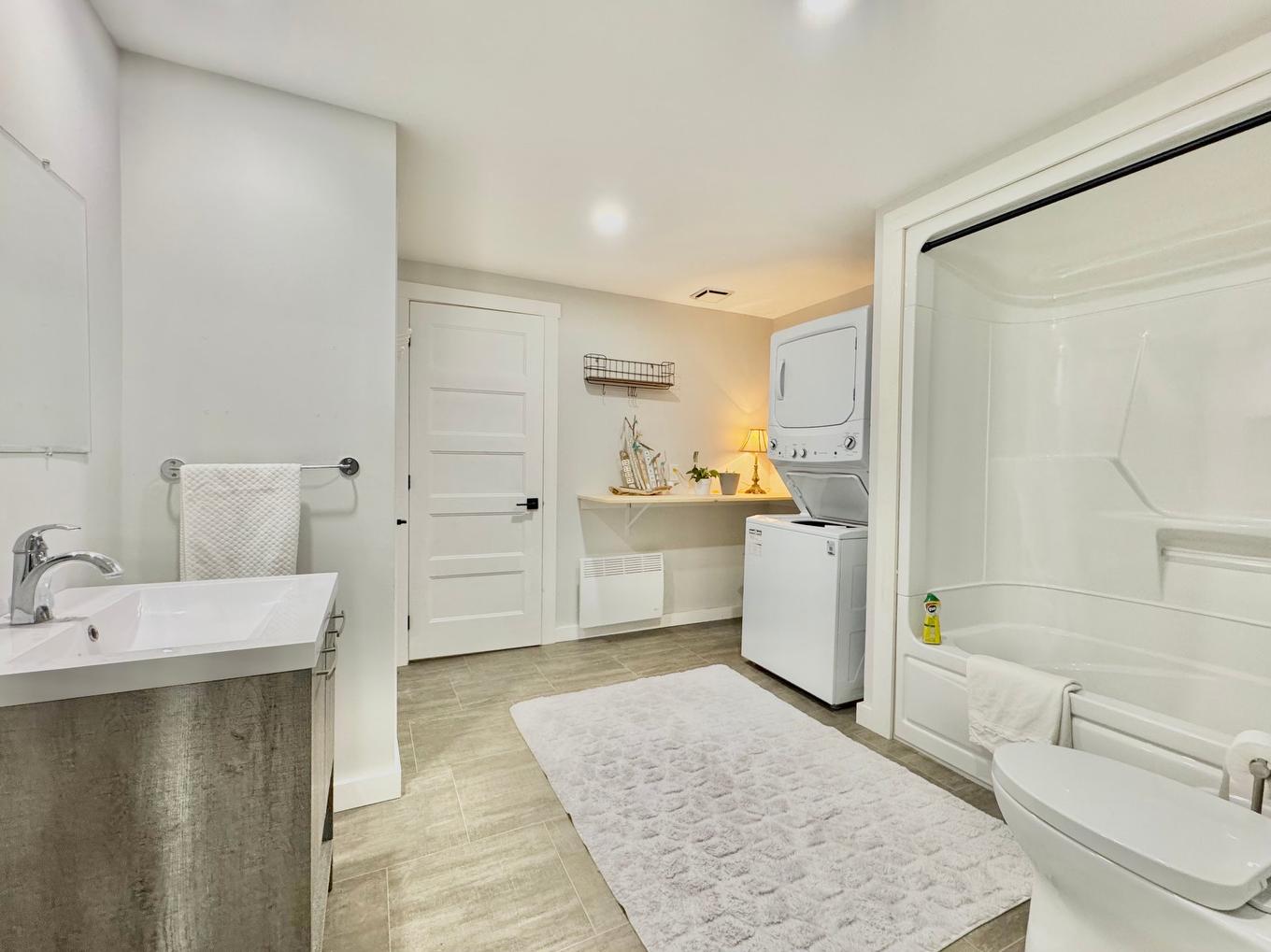 Basement - 35 Ch. Central, Les Îles-De-La-Madeleine, QC - Indoor Photo Showing Laundry Room