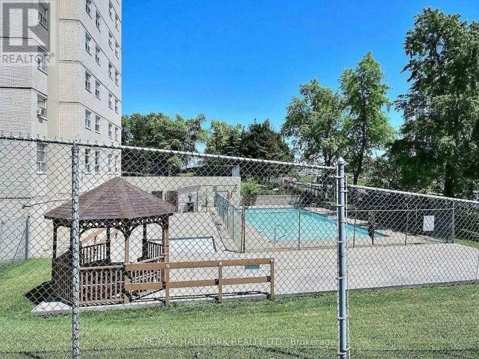 817 - 5 Parkway Forest Drive N, Toronto, ON - Outdoor With In Ground Pool
