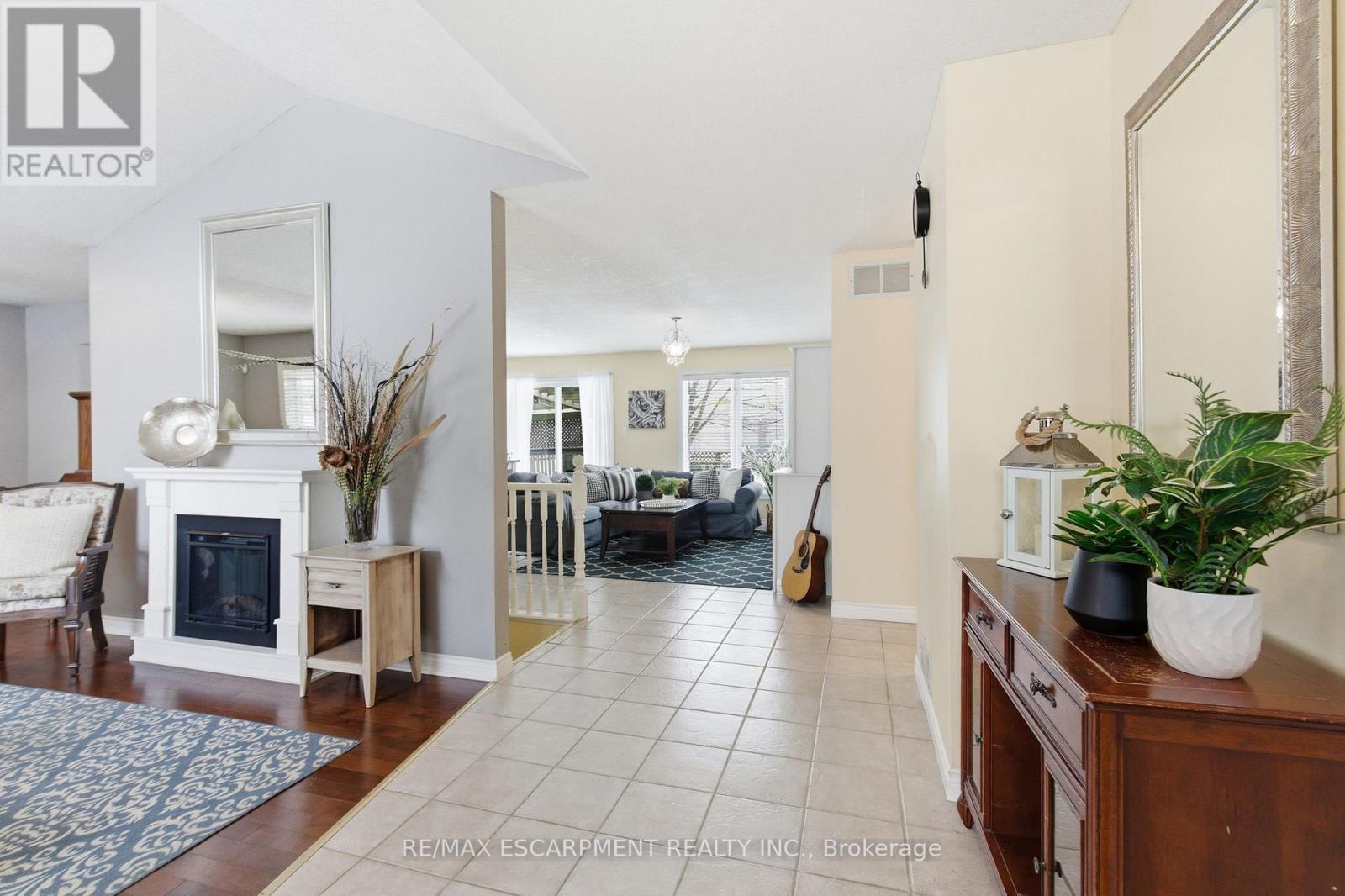 65 Thistlemoor Drive, Haldimand, ON - Indoor Photo Showing Other Room With Fireplace